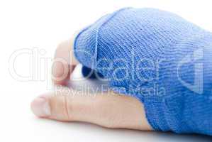 Hand bandaged in blue plaster