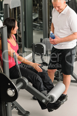 Personal trainer at fitness center show exercise