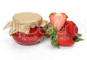 Fresh Strawberries with jam-jar closeup