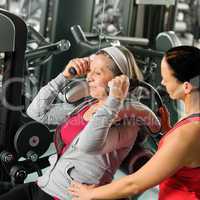 Senior woman exercise with personal trainer