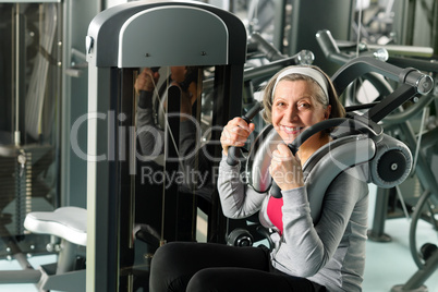 Fitness center senior woman exercise smiling