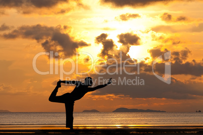 Man silhouette doing yoga exercise natarja