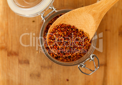 mixture spice in a wooden spoon
