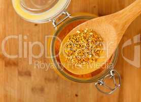 spice saffron and pepper in a wooden spoon