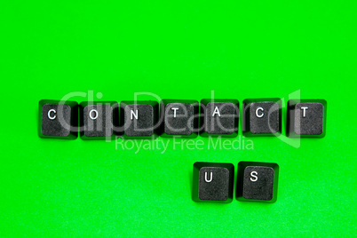 Keyboard plastic keys with words Contact Us