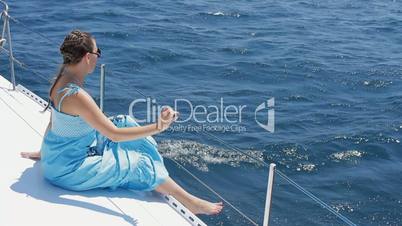 A woman on a yacht