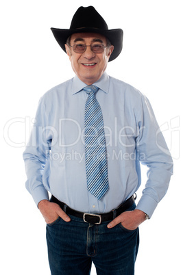 Portrait of a senior cowboy wearing hat