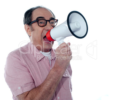 Senior casual male with megaphone