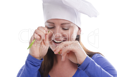 Woman with paprika and cucumber