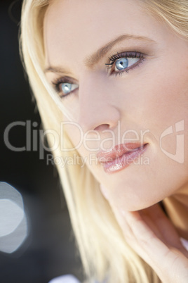 Portrait of Beautiful Young Blond Woman With Blue Eyes