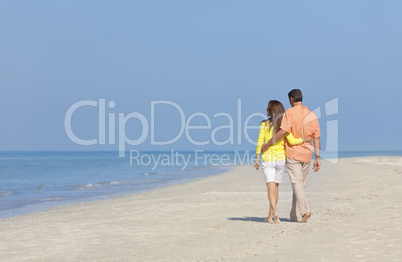 Couple Walking on An Empty Beach