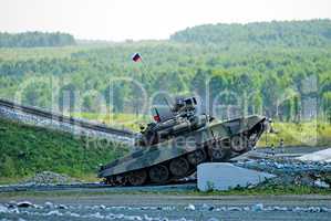Tank T-80 shoots sideward