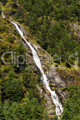 Himalaya Landscape: waterfall and forest trees