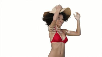 Junge Frau im Bikini und Hut