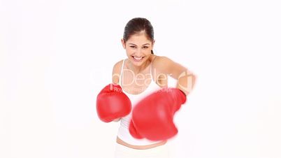 Frau mit Boxhandschuhen