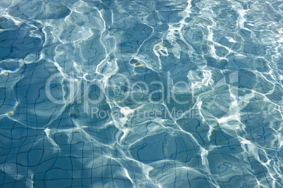 beautiful clear pool water reflecting in the sun