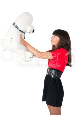 Pretty girl with bear toy