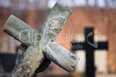 Leaning Cross at Cemetery
