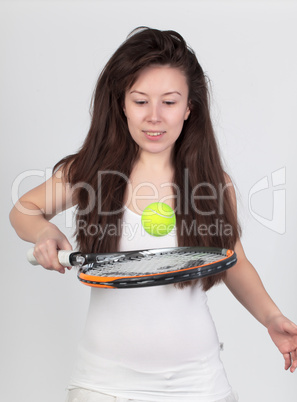 Young woman with tennis racket
