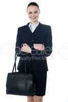Coporate lady holding a handbag