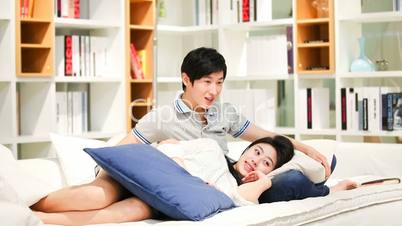 Happy loving couple in a living room