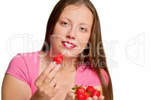 Girl gives strawberry