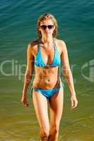 Summer beautiful woman in bikini water