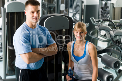 Young woman with fitness trainer