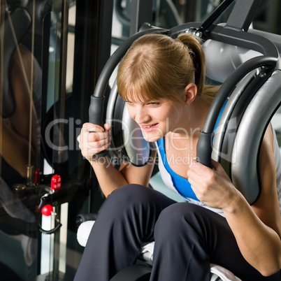 Fitness center young woman exercise abdominal