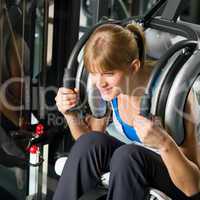 Fitness center young woman exercise abdominal