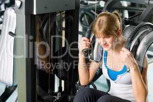 Young woman exercise abdominal fitness center