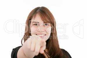 Portrait of a young smiling businesswoman pointing at you. Isola