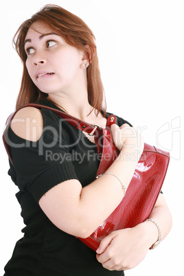 Woman getting her mace to protect herself from the thug who is a