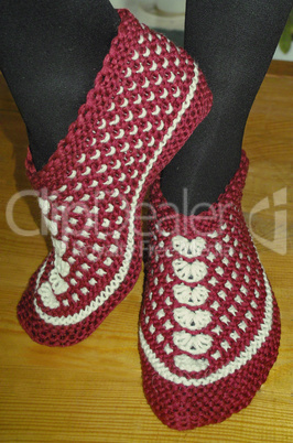 Hand knitted female slippers