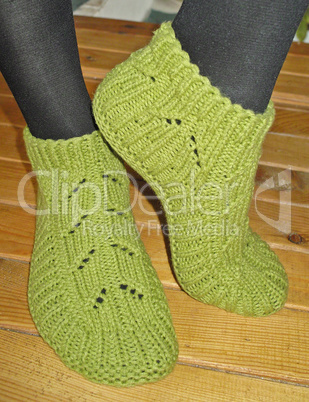 Hand knitted female slippers