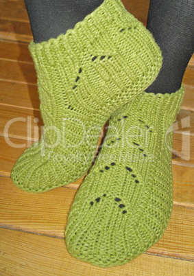 Hand knitted female slippers