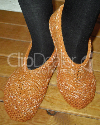 Hand knitted female slippers