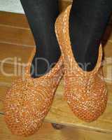 Hand knitted female slippers