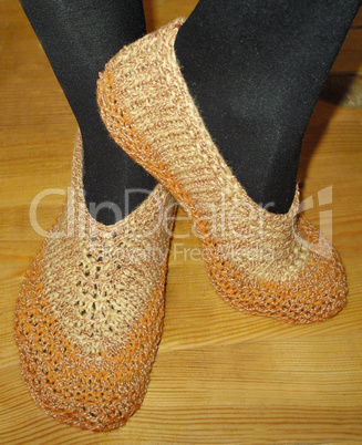 Hand knitted female slippers