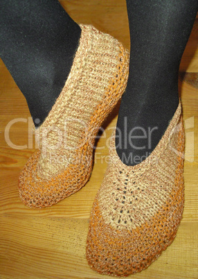 Hand knitted female slippers