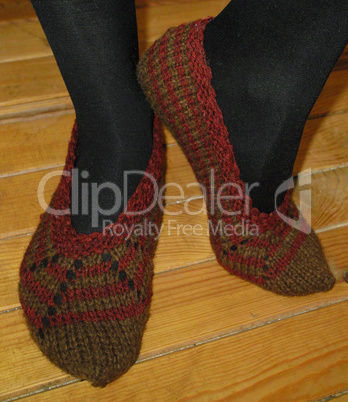 Hand knitted female slippers