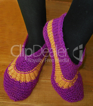 Hand knitted female slippers