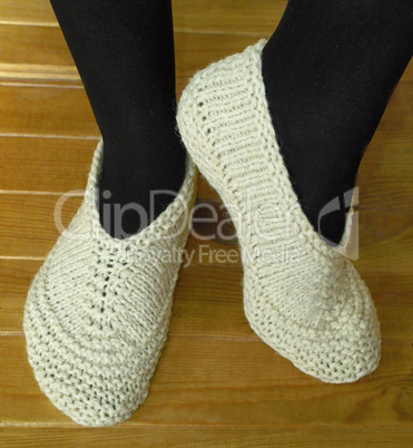 Hand knitted female slippers