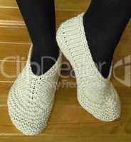 Hand knitted female slippers