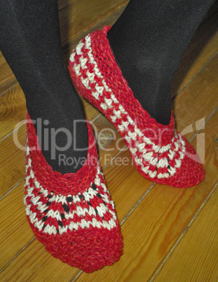 Hand knitted female slippers