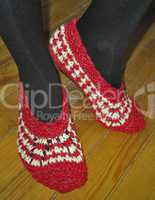 Hand knitted female slippers