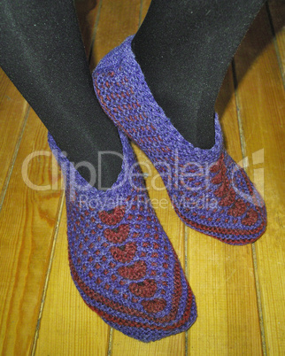 Hand knitted female slippers