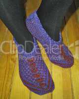 Hand knitted female slippers