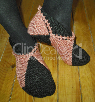 Hand knitted female slippers