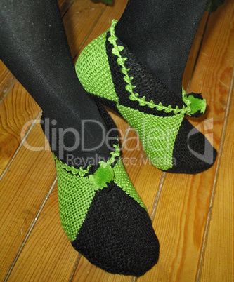 Hand knitted female slippers